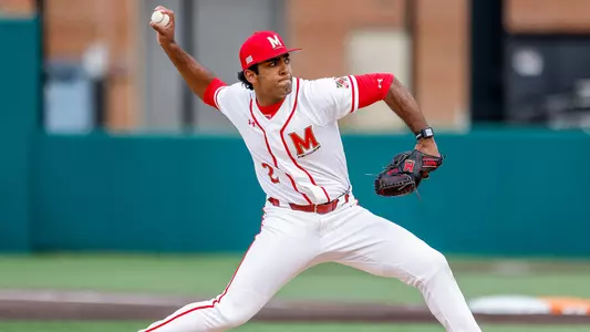 Andrew Koshy Delivers Pitch During Home Game
