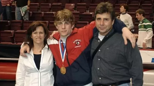 Mike Letts in high school with his parents