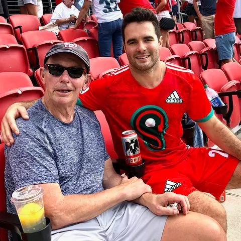 Nick Manis with his uncle Brian Adam