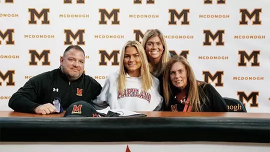 Kori Edmondson with her family signing her National Letter of Intent to play at Maryland in 2020