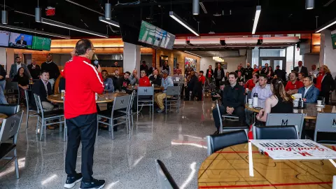 Jim Smith addressing athletic department staff