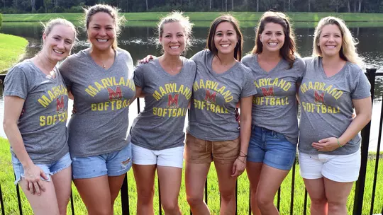 Jenny Belak with fellow softball alums