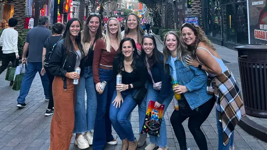 Jenny Belak with fellow Terp alums in Las Vegas