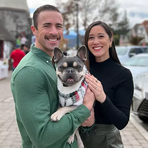 Jenny Belak with her husband Dylan and dog Meatball