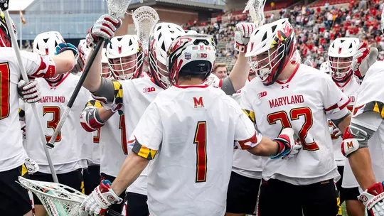 Logan McNaney with his teammates