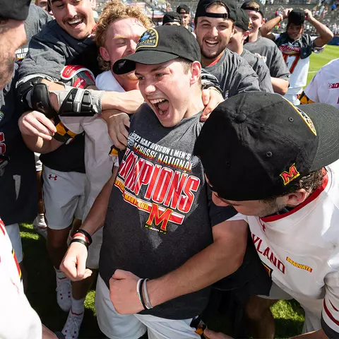 Logan McNaney celebrating the 2022 NCAA Championship