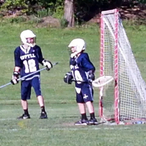 Logan McNaney playing one of his first games as a youth lacrosse goalie