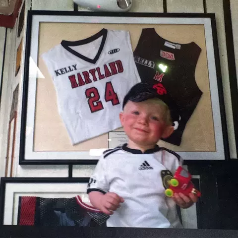Megan Kelly's son Flo at Bentley's with her jerseys on the wall