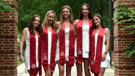 Kristin Nichols with her teammates for graduation