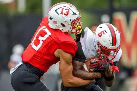 Defensive Back Lavain Scruggs (13), Wide Receiver Octavian Smith Jr. (5)
Maryland Football during Fall camp practice at Jones-Hill House in College Park, MD on Friday, Aug. 1, 2025.
Dylan Davies/Maryland Terrapins