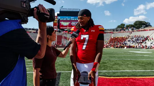 Malik Washington during a postgame television interview
