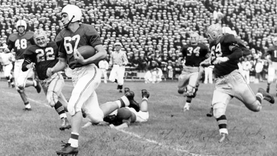 Jack Scarbath scores the first touchdown at then-Byrd Stadium on Sept. 30, 1950 against Navy.