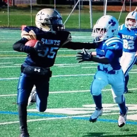 Octavian Smith Jr. as a youth playing football