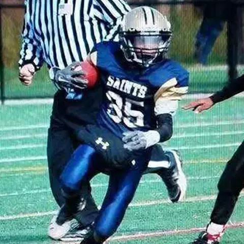 Octavian Smith Jr. as a youth playing football