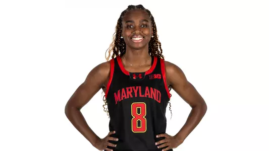 Kyndal Walker posed black uniform
