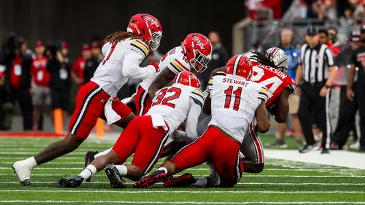 Maryland tackles an Ohio State ball carrier
