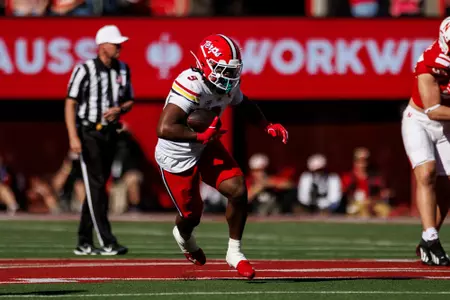 Dorian Fleming running with the ball against Nebraska