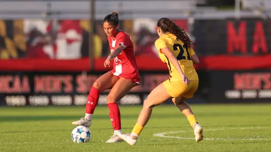 Kamryn Cole moves upfield against Iowa
