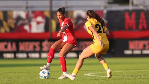 Kamryn Cole moves upfield against Iowa