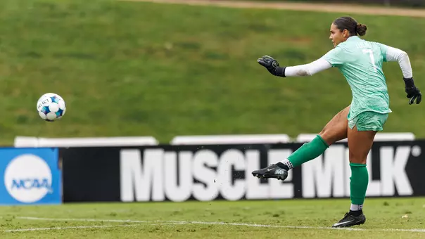 Faith Luckey kicks a ball