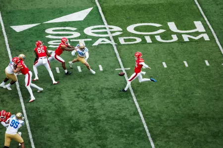 Bryce McFerson punts against UCLA
