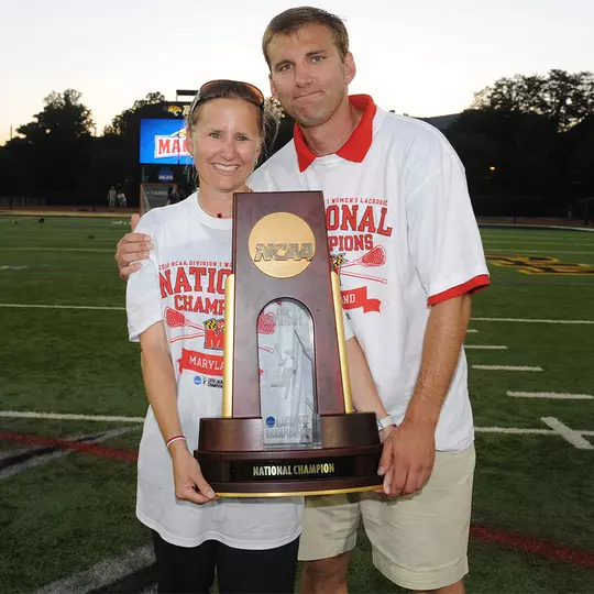 Cathy and Brian Reese with the 2010 NCAA Championship trophy