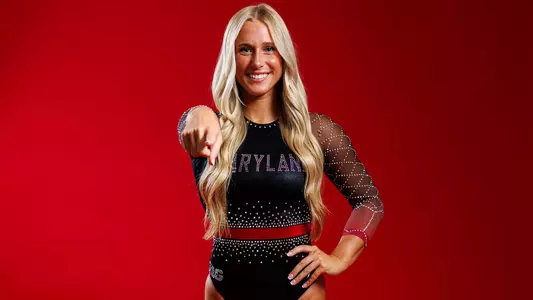 Taylor Rech Posed Red Background