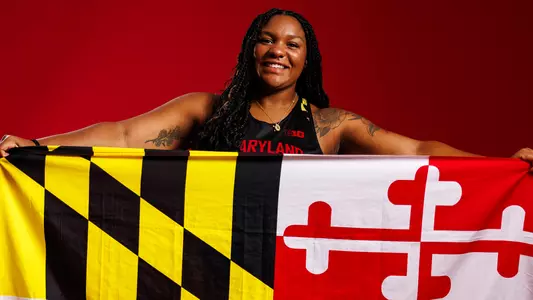 Ella O'Neall poses at track and field content day