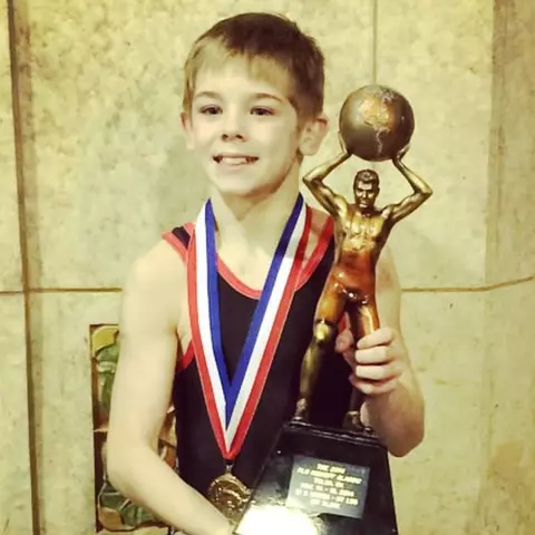 Carter Young as a youth at a wrestling tournament