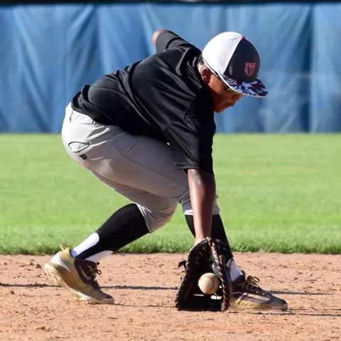 Paul Jones II as a youth playing baseball