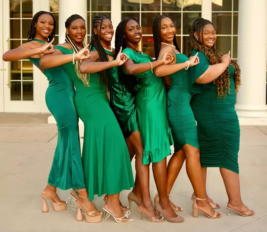 Mir McLean with her sorority sisters in formal dresses