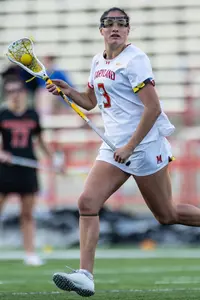 Kristen Shanahan clears a ball against James Madison at SECU Stadium