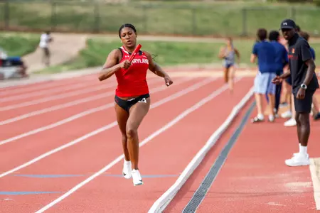 Maya Mosley competes at the Kehoe Twilight Meet