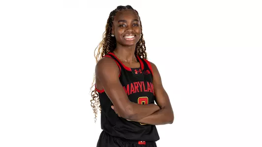 Kyndal Walker black uniform posed