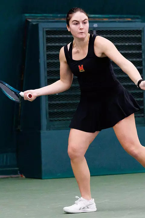 Tamari Gagoshidze hitting a shot during a Maryland tennis match