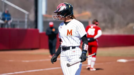 Caitlyn Cornwell holding a bat