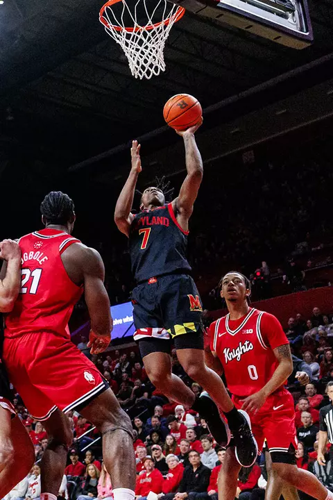 Andre Mills scoring on a layup during a game for Maryland men's baskletball