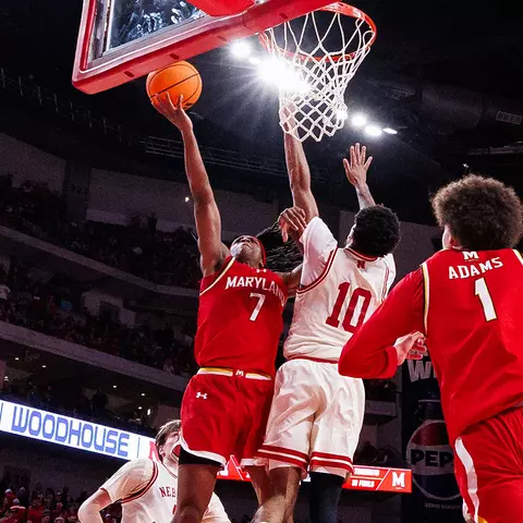 Andre Mills scoring on a layup during a game for Maryland men's baskletball
