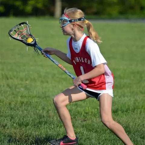 Lauren LaPointe as youth girl's lacrosse players
