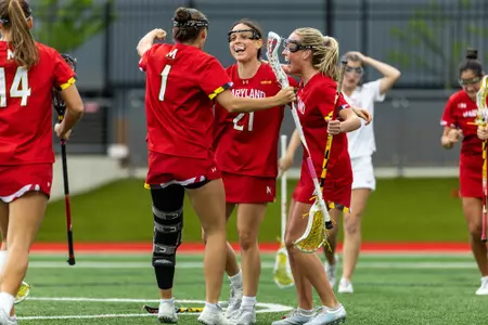 Jordyn Lipkin, Lexi Dupcak and Maisy Clevenger celebrate a goal against Ohio State.
