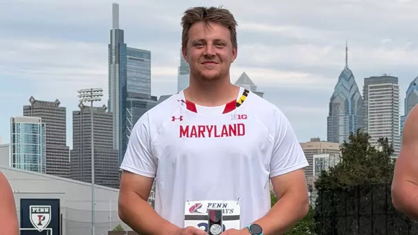 Rhys Allen poses on the podium at the Penn Relays
