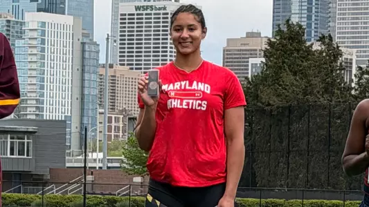 Morgan Graham poses at the Penn Relays on the podium