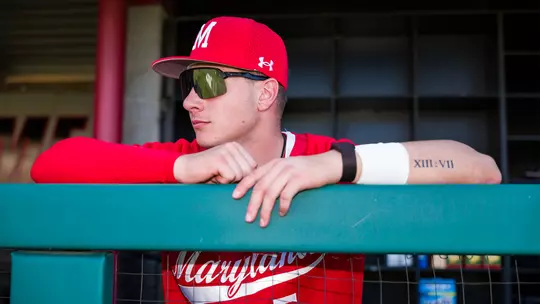 Ty Kaunas leaning on the rail in the dugout