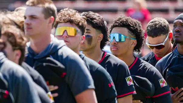 Maryland Baseball Schedule Change - team lines up for anthem