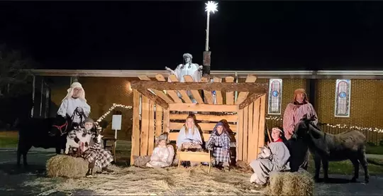Jaylee Williams and her family with their animals at a Living Nativity display