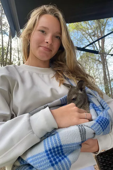 Jaylee Williams with a small animal