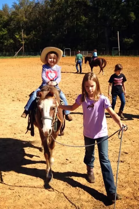 Jaylee Williams as a youth with a pony