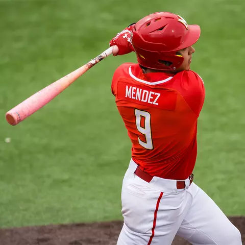 David Mendez taking a swing