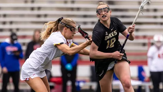 Maddy Sterling defending in a game at SECU Stadium