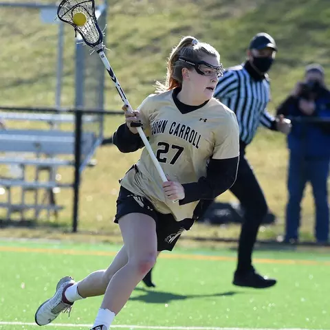 Maddy Sterling playing lacrosse at John Carroll